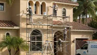 Professional painters in West Palm Beach, FL painting a home exterior with clean, even coverage